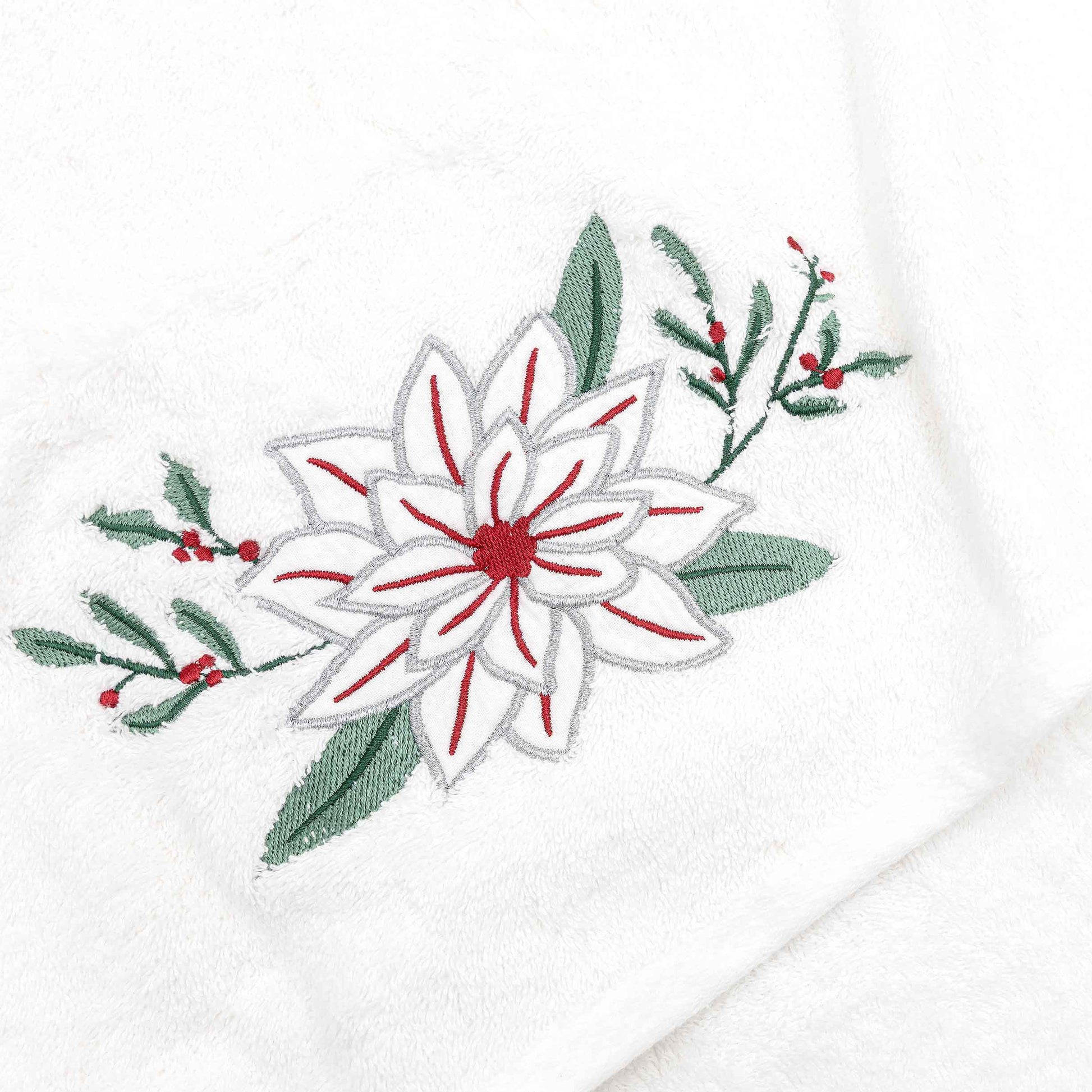 Baltas rankšluostis su gėle