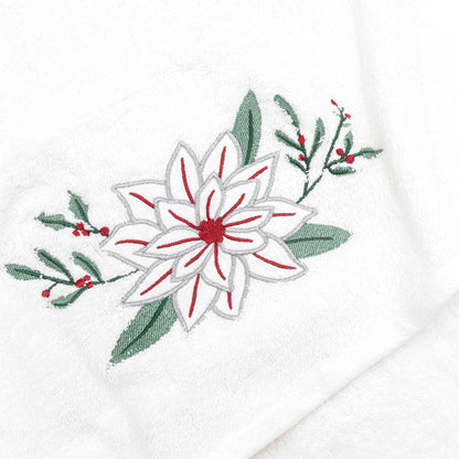 Baltas rankšluostis su gėle